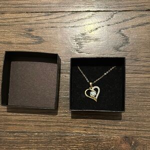 “Genuine Blue Topaz Heart Pendant”